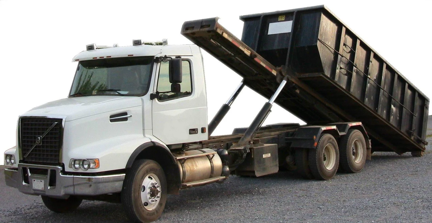 Roll-off dumpster truck with a raised container